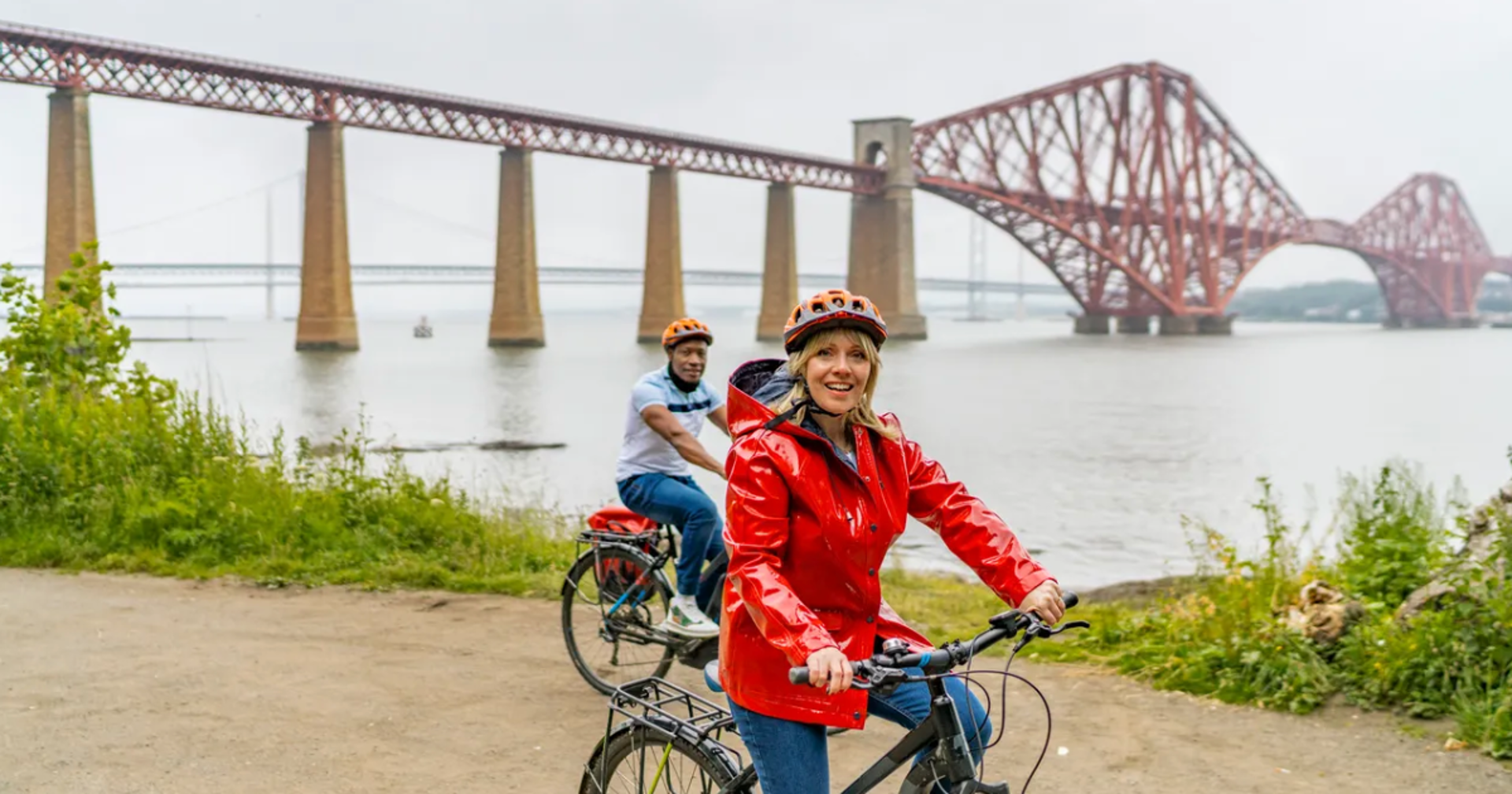 Cycling by Forth Bridge (Visit Scotland)